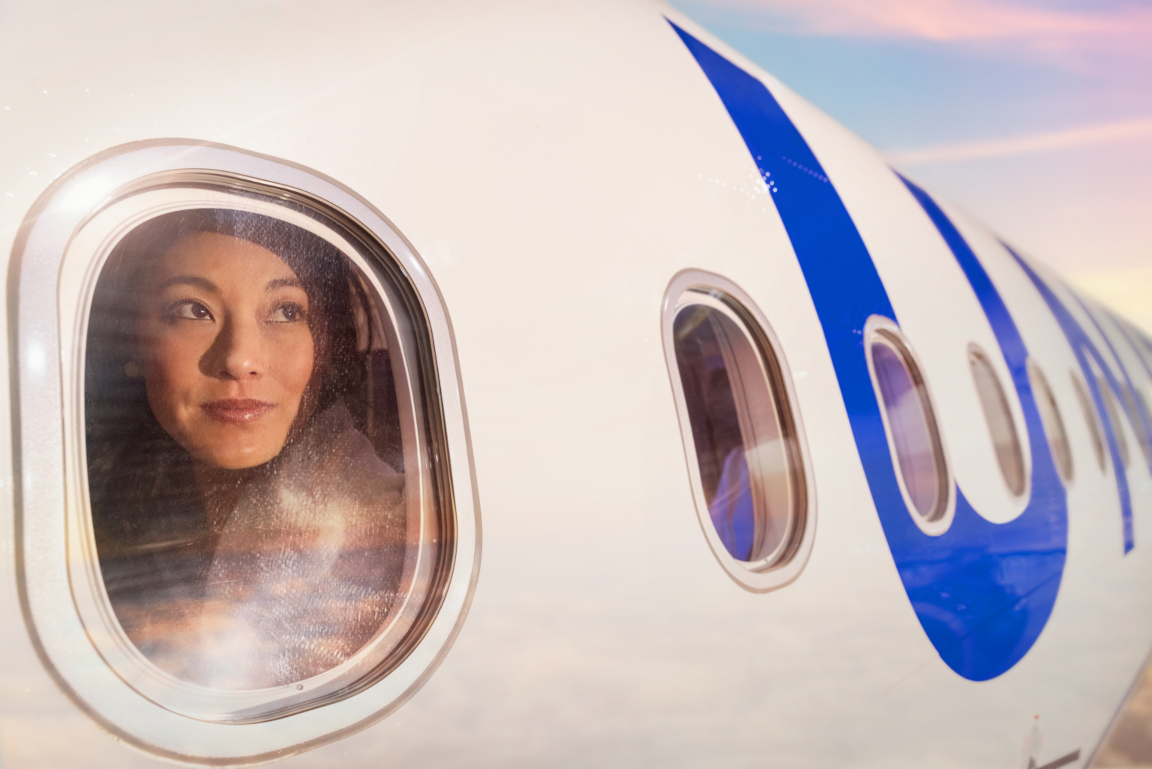 Woman at plane window